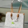 Louis Vuitton Size: 35 x 27 x 14 cm